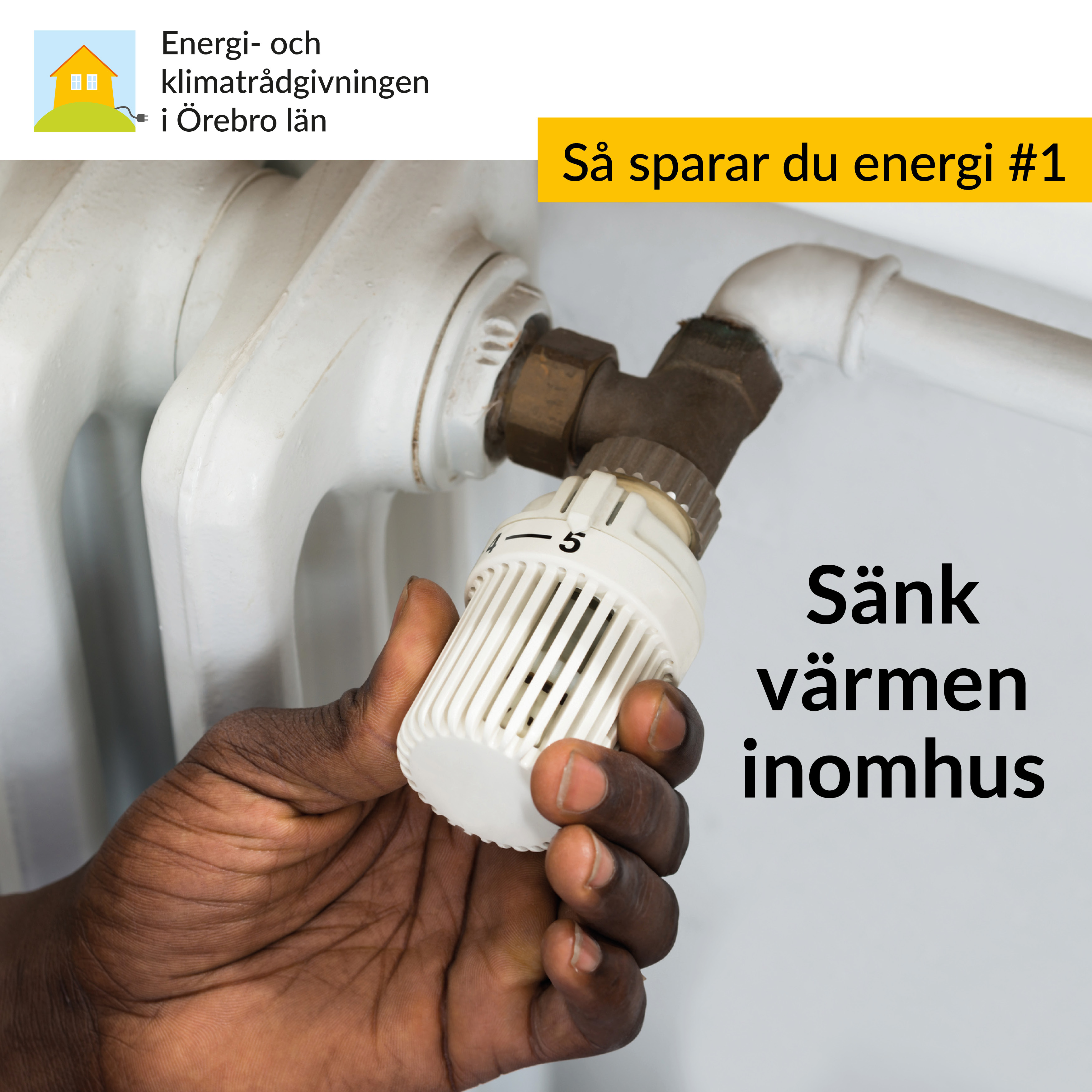 En person sänker värmen på ett element