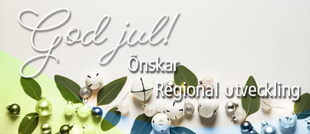 Julkort från Regional utveckling. Vita bjällror och julgranskulor.